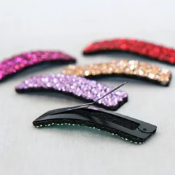 Guld clic-clac hårspænde med rhinsten