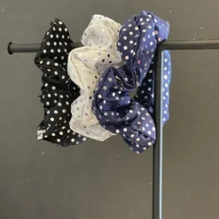 Mørkeblå hårelastik med trykte palietter